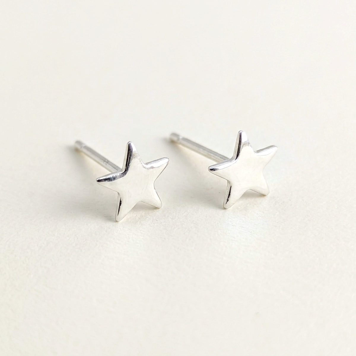 'Fallen Star' Sterling Silver Tiny Star Stud Earring