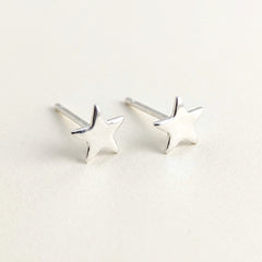 'Fallen Star' Sterling Silver Tiny Star Stud Earring, view 1
