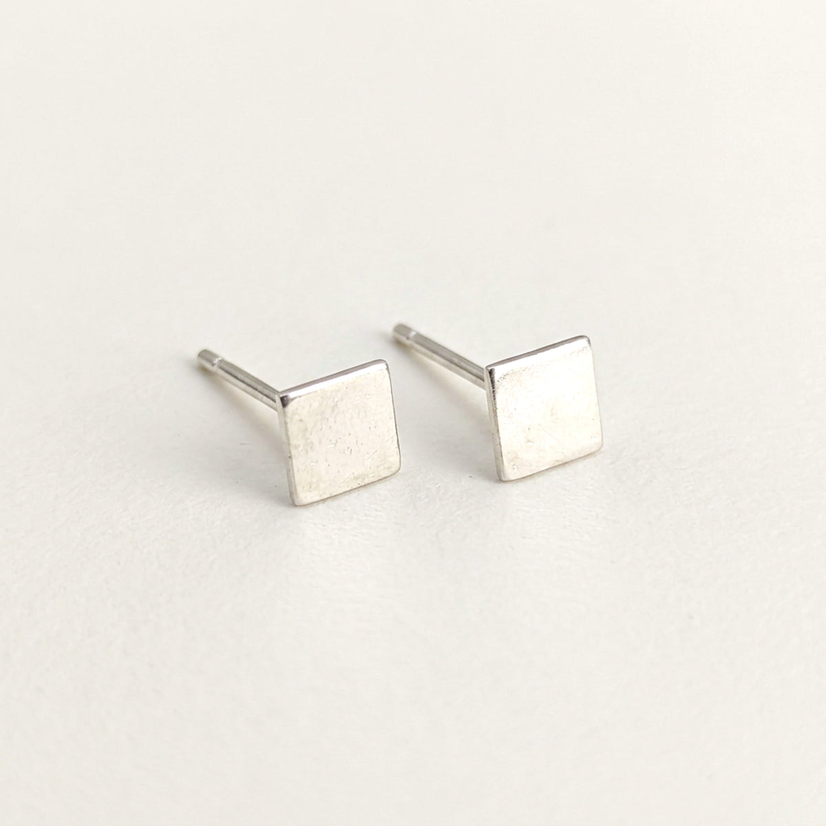 'Equal' Sterling Silver Tiny Square Stud Earring