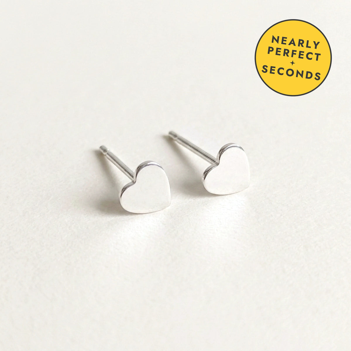 'Queen' Sterling Silver Tiny Heart Stud Earring — Seconds (nearly perfect seconds)