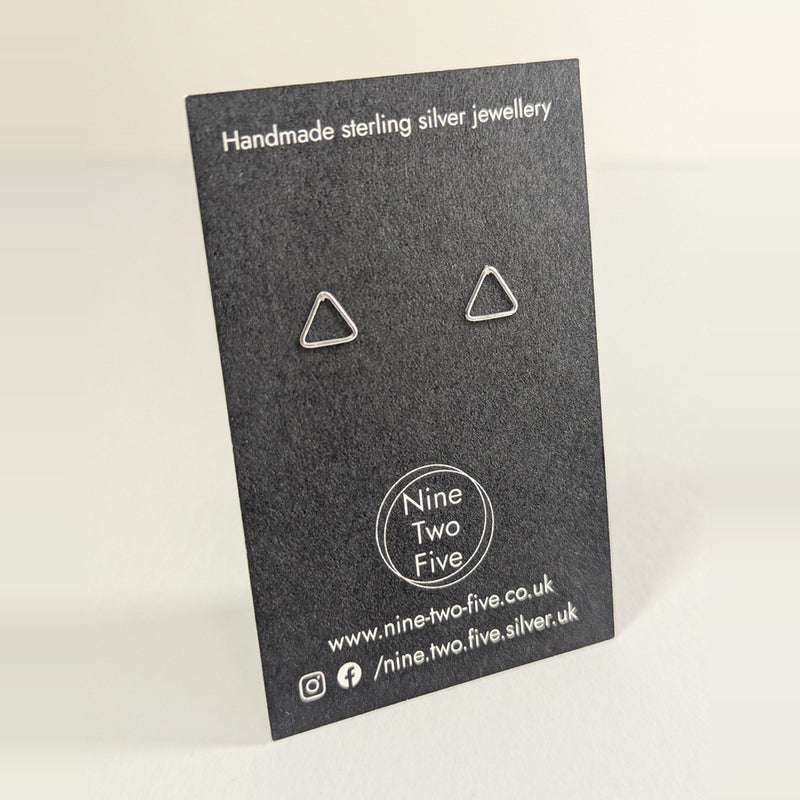 'Tria' Sterling Silver Tiny Open Triangle Stud Earring on the Nine Two Five earring card