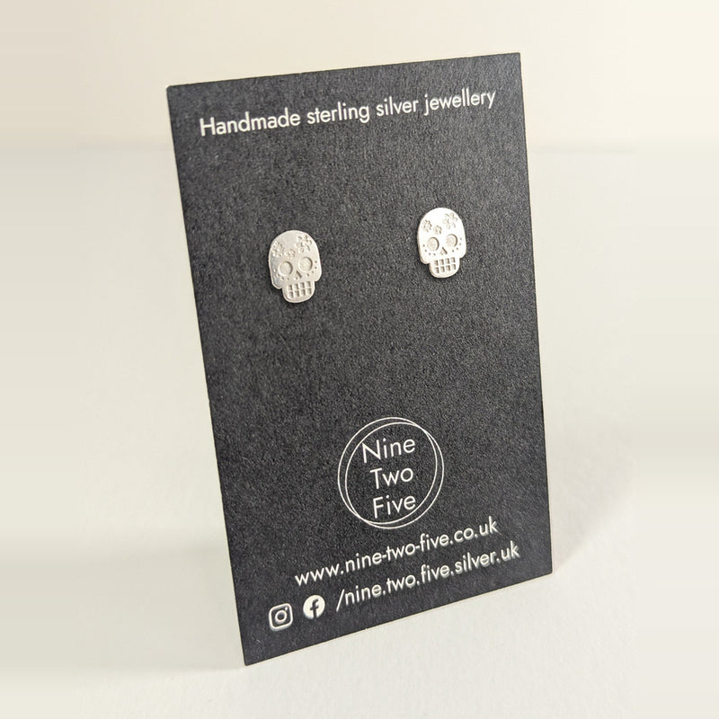 'Bloom' Flower Skull Silver Stud Earring on the Nine Two Five earring card