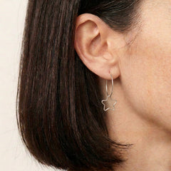 'Starlight' Sterling Silver Large Star Hoop Earring, worn, view 2