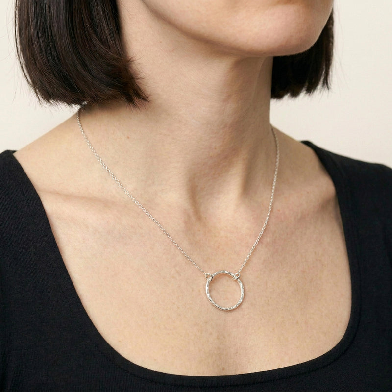 'Eclipse' Sterling Silver Large Hammered Circle Pendant, worn