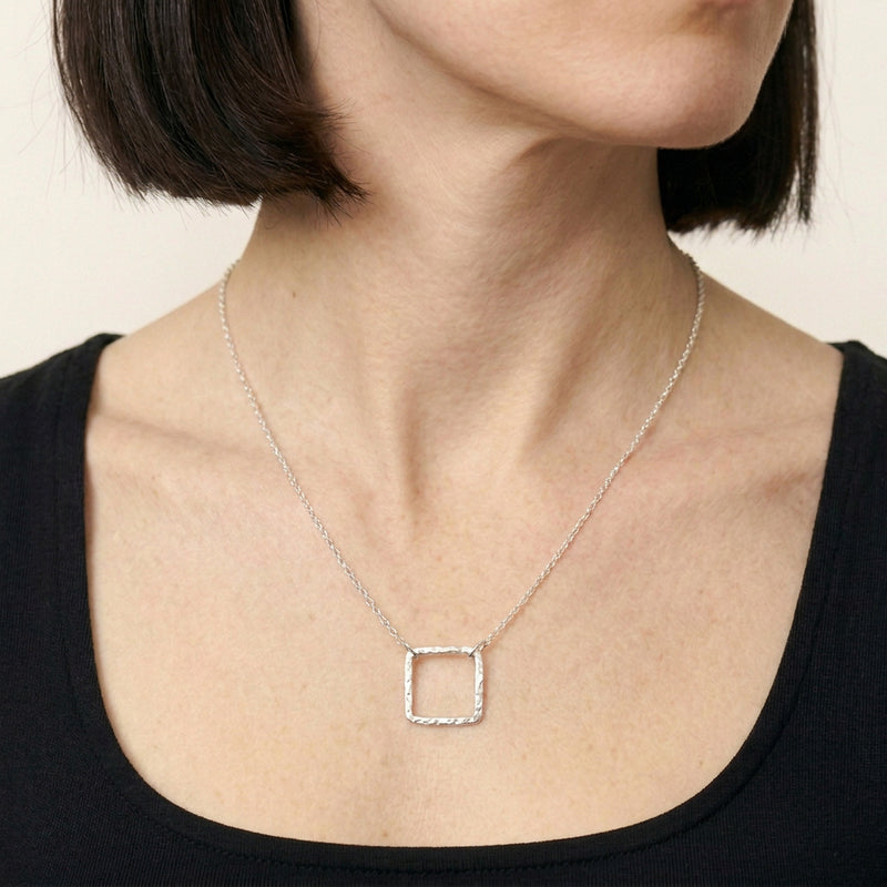 'Equal' Sterling Silver Square Pendant, worn
