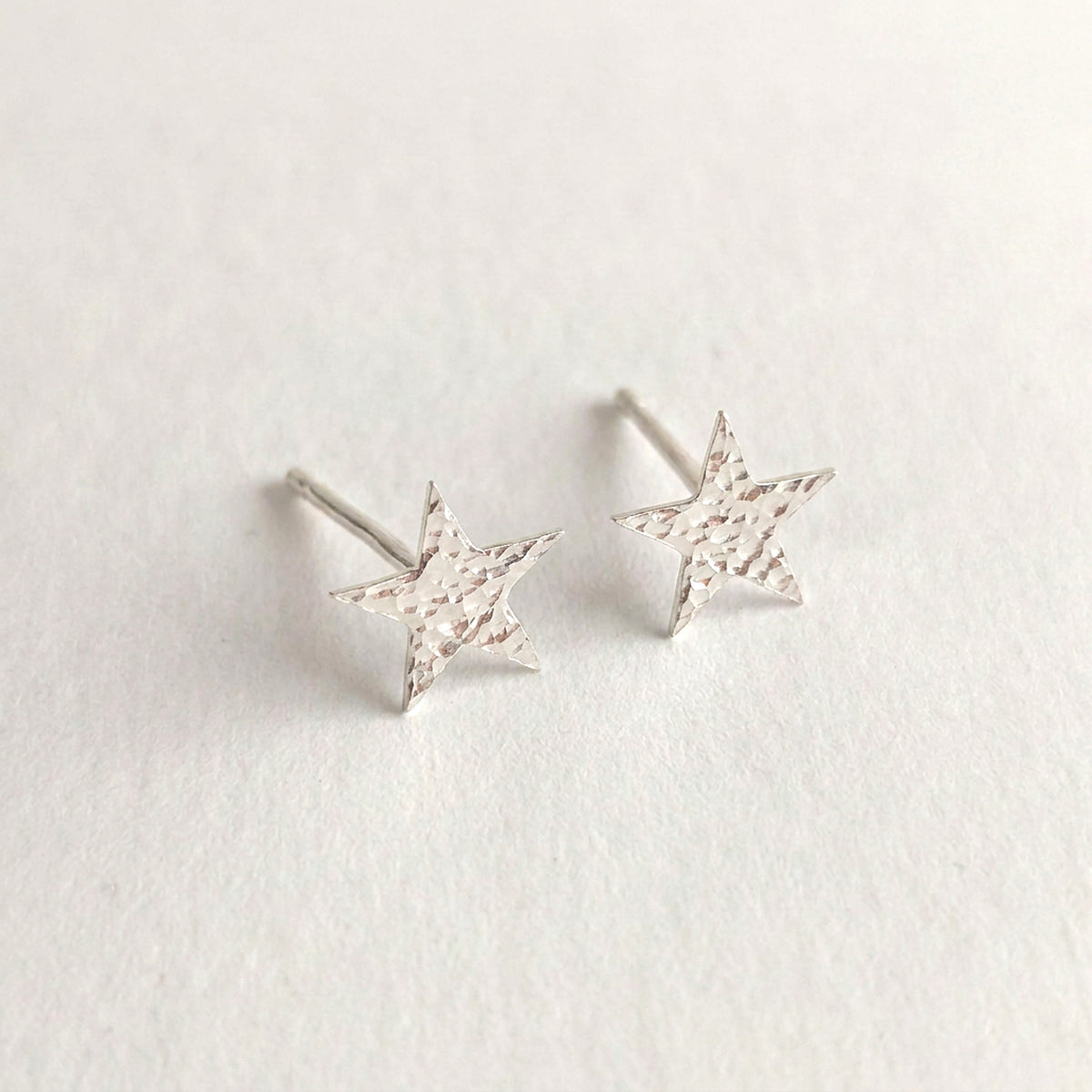'Fallen Star' Sterling Silver Small Hammered Star Stud Earring