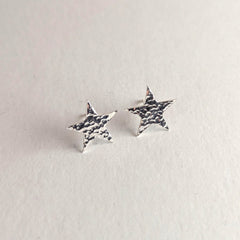 'Fallen Star' Sterling Silver Large Hammered Star Stud Earring, view 1